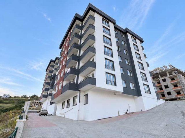 REMAX PARLA BARLAS GÜRLER'DEN KİRALIK DENİZ MANZARALI 1+1