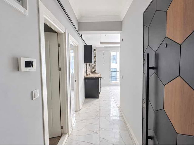 REMAX PARLA BARLAS GÜRLER'DEN KİRALIK DENİZ MANZARALI 1+1