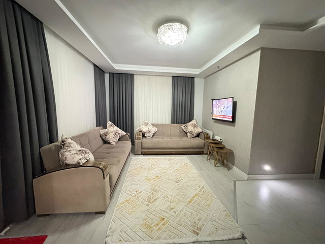 REMAX RINA'DAN MEZITLI'DE ŞEHIR VE DENIZ MANZARALI 2+1 DAIRE