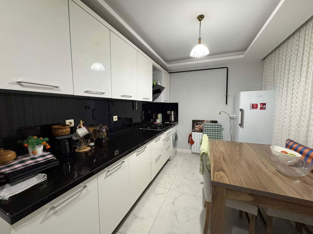 REMAX RINA'DAN MEZITLI'DE ŞEHIR VE DENIZ MANZARALI 2+1 DAIRE