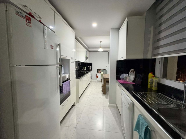 REMAX RINA'DAN MEZITLI'DE ŞEHIR VE DENIZ MANZARALI 2+1 DAIRE