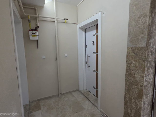 KONAK KARATAŞ DA AYRI MUTFAK ASANSÖRLÜ ARAKAT 1+1 SATILIK DAİRE