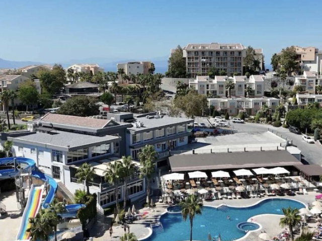 GOLF RESORT KUŞADASI SATILIK DENİZ MANZARALI 2+1 EŞYALI DAİRE