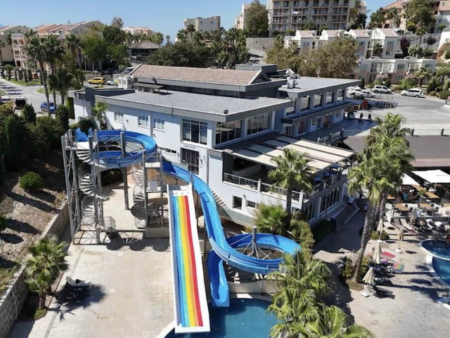 GOLF RESORT KUŞADASI SATILIK DENİZ MANZARALI 2+1 EŞYALI DAİRE