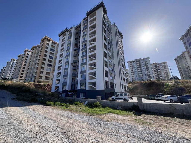 KUŞADASI UYDUKENT’TE DENİZ MANZARALI FULL TADİLATLI 2+1 DAİRE