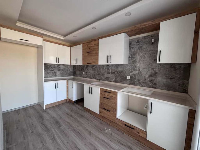 KUŞADASI UYDUKENT’TE DENİZ MANZARALI FULL TADİLATLI 2+1 DAİRE