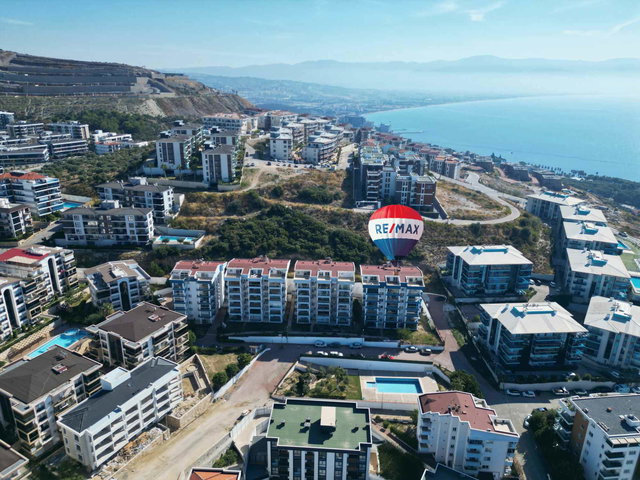KUŞADASI DEĞİRMENDERE’DE 2+1 | BAHÇE KATI | 2 BANYO | BALKONLU SATILIK DAİRE