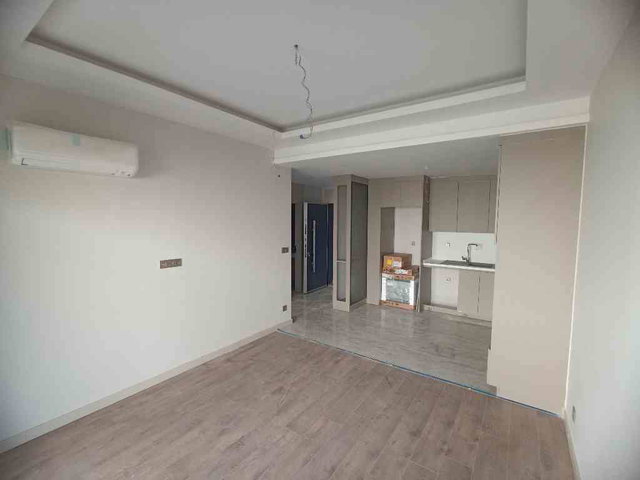 DÖŞEMEALTI ÇIPLAKLI'DA SUNCİTY 1 SİTESİNDE 1+1 KİRALIK DAİRE