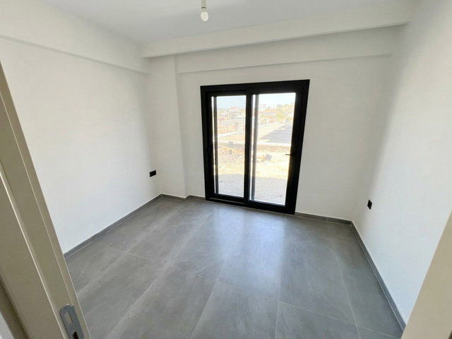 GÜLBAHÇE'DE HAVUZLU SİTE İÇİ DENİZ MANZARALI SIFIR KİRALIK 1+1