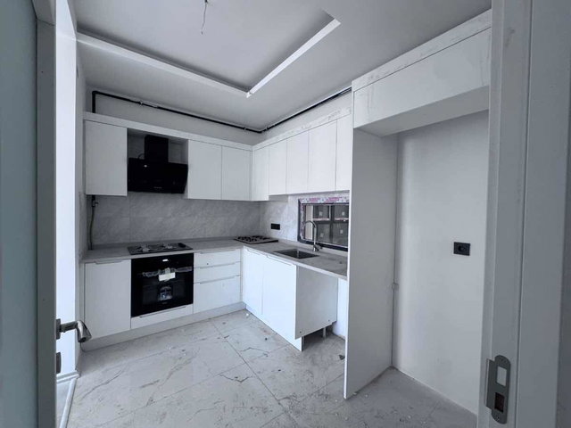 BAYRAKLI MANAVKUYU MAHALLESİNDE 3+1 SATILIK DAİRE