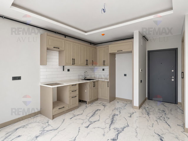 REMAX AVLU'DAN MEZİTLİ'DE HAVUZLU SİTE İÇİ SIFIR SATILIK 2+1 DAİRE