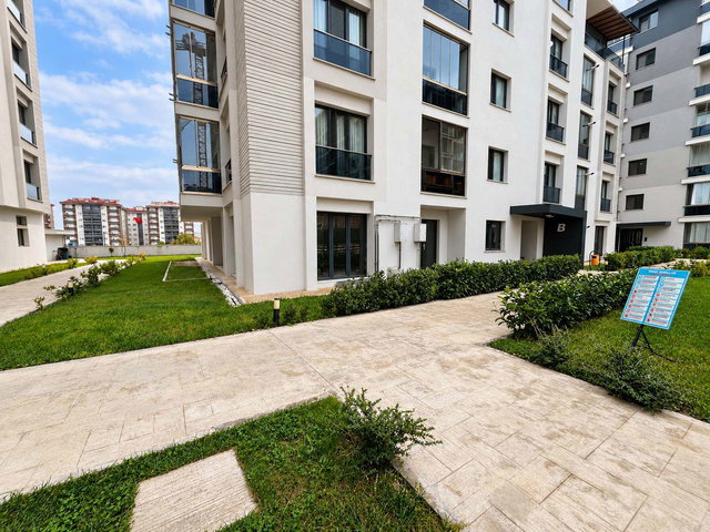 REMAX LAND'DEN INFINITY LIVING SİTESİNDE SIFIR 2+1 BAHÇE KATI KİRALIK DAİRE