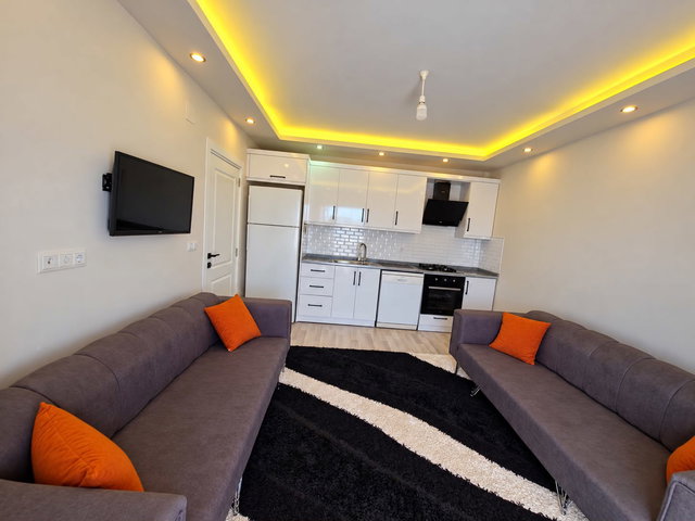 ERDEMLİ MERKEZDE | SIFIR KULLANILMAMIŞ | FULL EŞYALI | 65 M² GENİŞ 1+1 SATILIK DAİRE