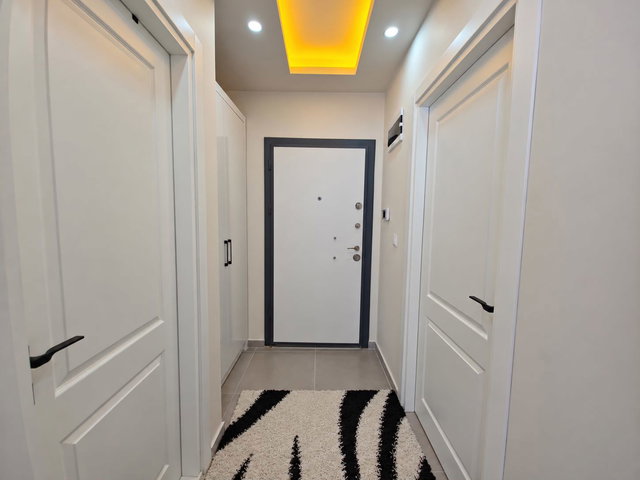 ERDEMLİ MERKEZDE | SIFIR KULLANILMAMIŞ | FULL EŞYALI | 65 M² GENİŞ 1+1 SATILIK DAİRE