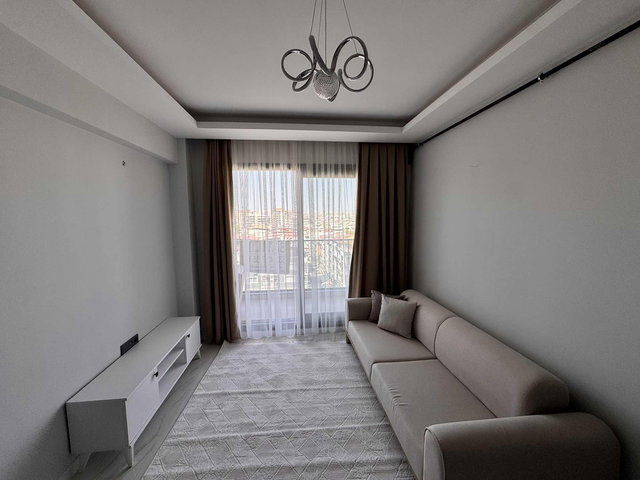 NOVUSS GAYRİMENKUL\SİTE İÇİ ARAKAT SIFIR EŞYALI SATILIK 1+1