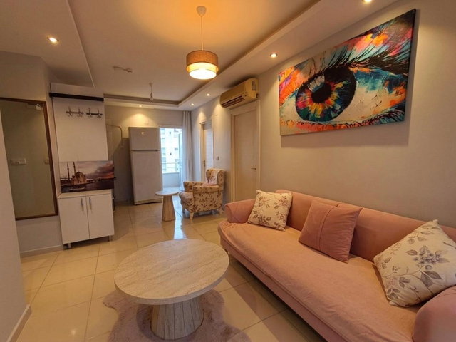 ÜNİVERSİTE CADDESİNDE FULL EŞYALI ÜÇ BALKONLU 1+1 SATILIK DAİRE
