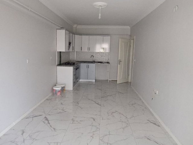 CARŞI MERKEZDE 3CÜ KAT YENİ BİNA KİRALIK DAİRE