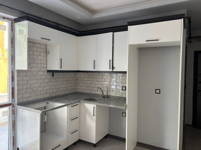 FA ÖZBİR'DEN 70 m² TERASLI YÜKSEK GİRİŞ 1+1 İSKANLI SON 1 DAİRE.