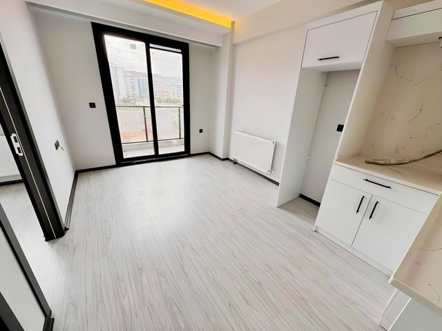 NOVUSS GAYRİMENKUL\KONSEPT PARK SİTESİ BALKONLU EŞYASIZ 1+1