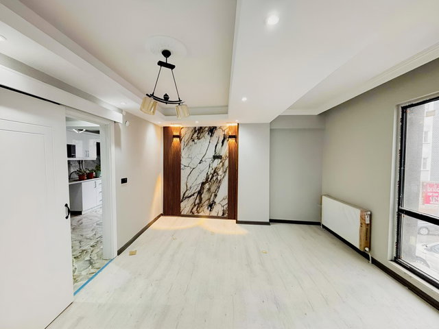FA ÖZBİR'DEN MERKEZİ KONUMDA CAMBALKONLU İSKANLI 2+1 DAİRE