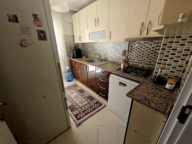 PAZAR YERİ YAKININDA SİTE İÇERİSİNDE ÖNÜ AÇIK SATILIK DAİRE.