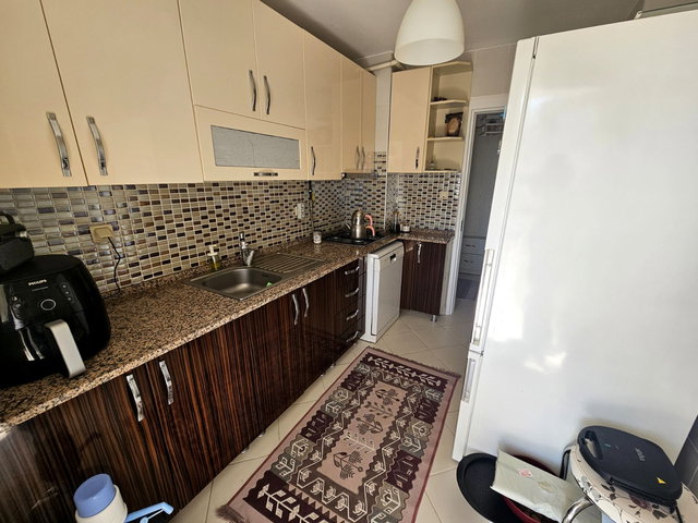 PAZAR YERİ YAKININDA SİTE İÇERİSİNDE ÖNÜ AÇIK SATILIK DAİRE.