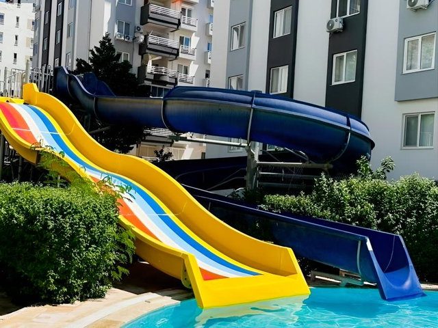 Konyaaltı Sarısu Tenis Resort Sitesinde Havuzlu Doğalgazlı 3+1